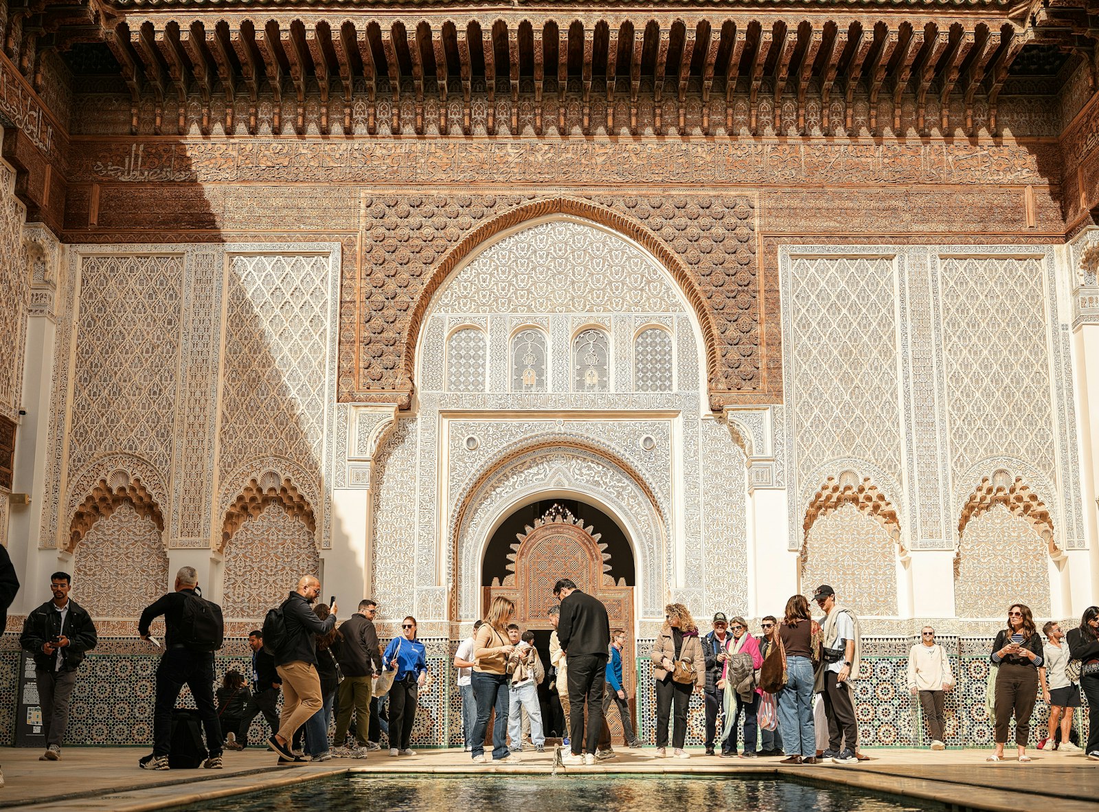 Riad courtyard with carved plaster arches, Marrakech