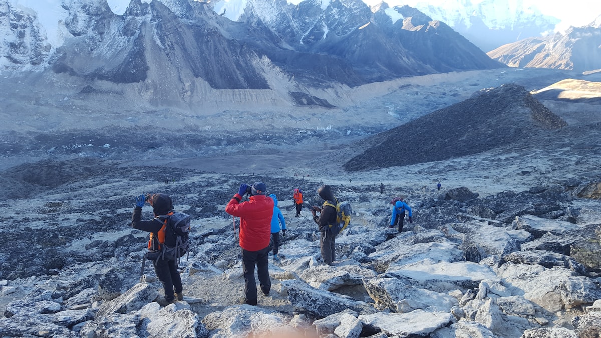 Trekkers crossing the Khumbu Glacier moraine
